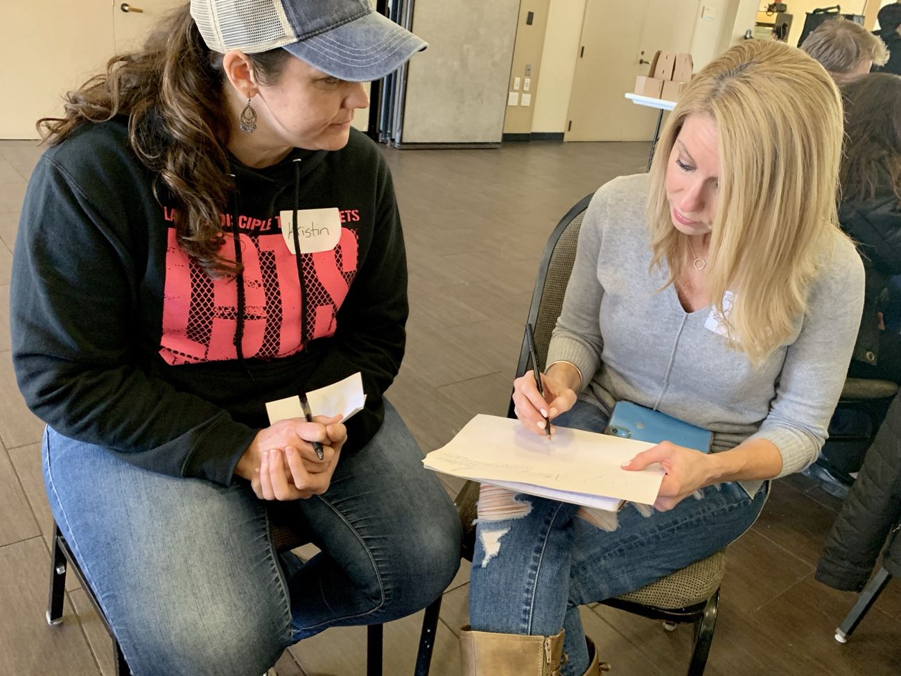 Two participants practicing a one-on-one disciple-making conversation